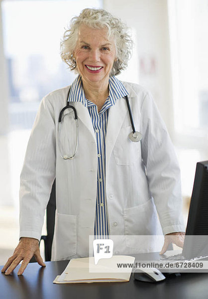 USA  New Jersey  Jersey City  Portrait of senior female doctor in office
