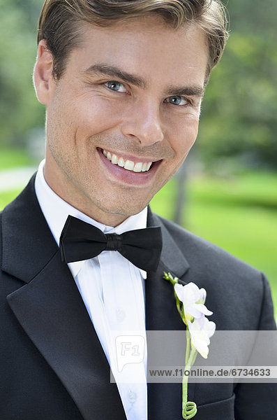 Close-up of smiling groom