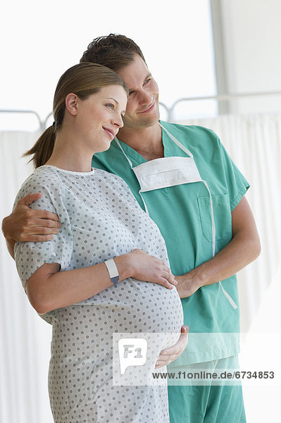 Pregnant woman with partner in hospital