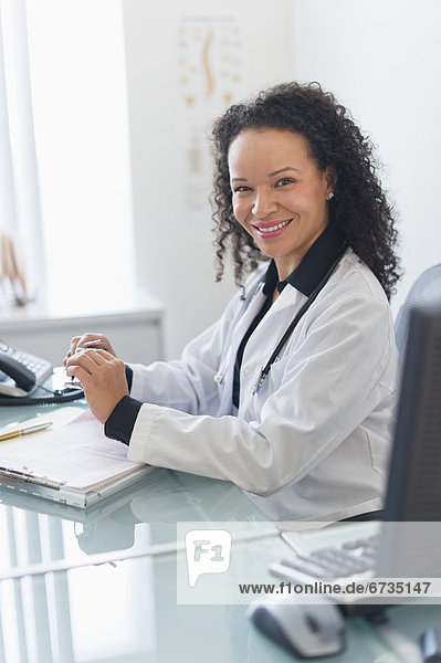 Portrait of female doctor in office