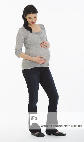 Studio shot of pregnant woman