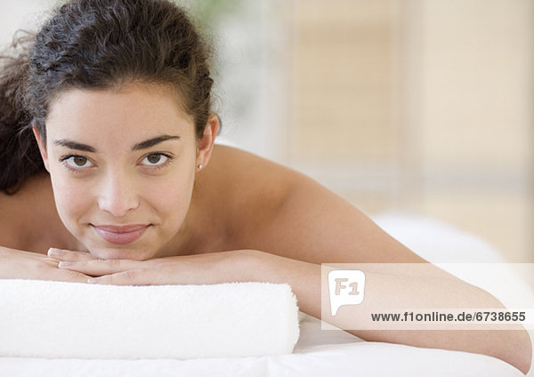 Woman laying on spa table