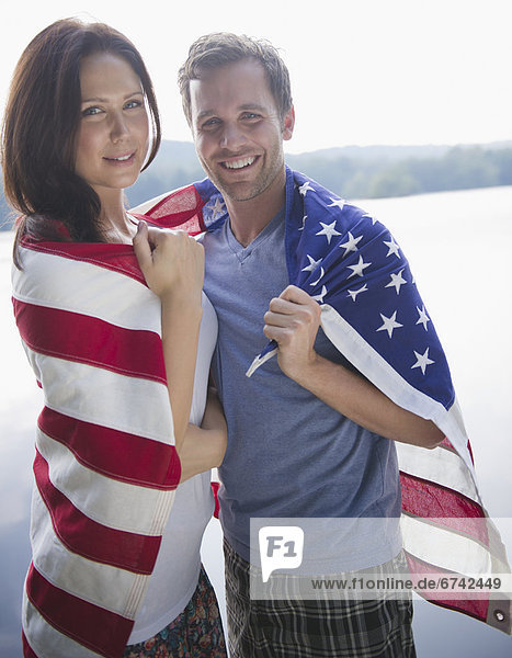 Roaring Brook Lake  Couple wrapped in American flag