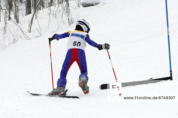 Ski Racer Retrieving Ski  Skyloft Resort  Ontario