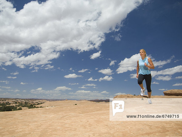 Woman jogging in desert