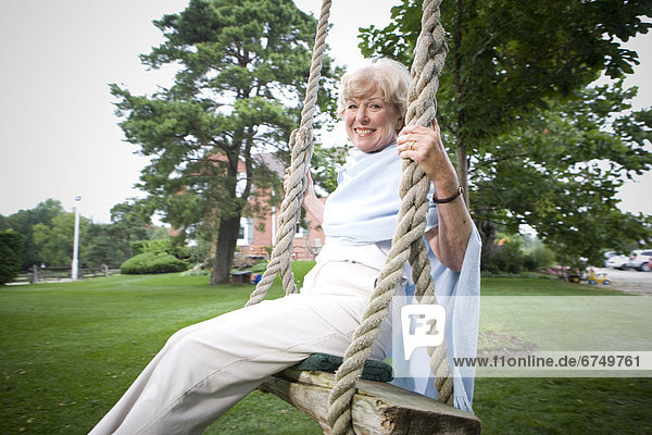 Senior Woman on Swing