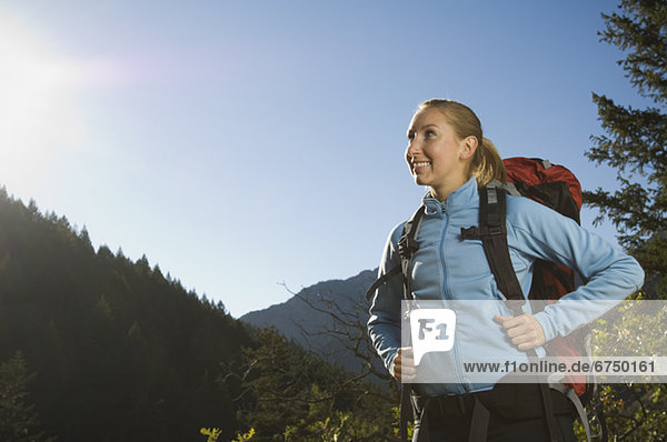 Female hiker looking to side  Utah  United States