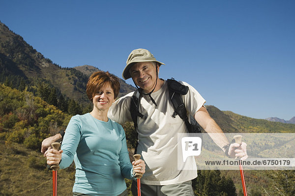 Senior couple holding hiking poles  Utah  United States