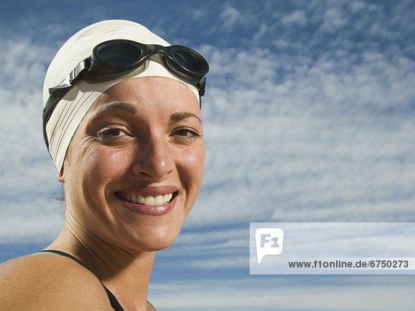 Frau Vereinigte Staaten von Amerika USA Schutzbrille Mütze Kleidung schwimmen Frau trägt Schwimmkappe und Schwimmbrille