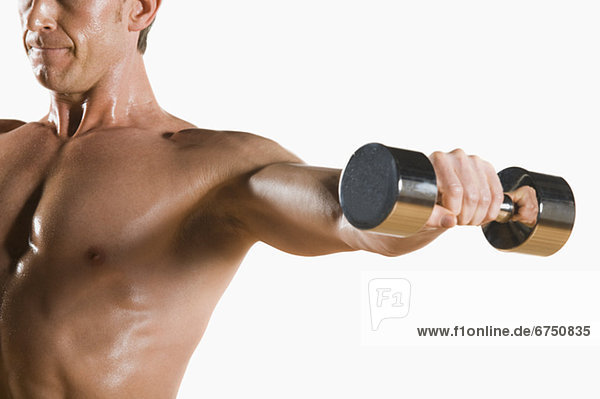 Male body builder flexing lifting weight