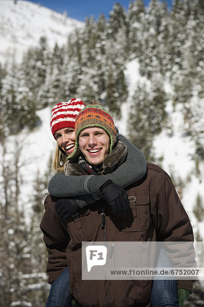A couple outdoors in the snow