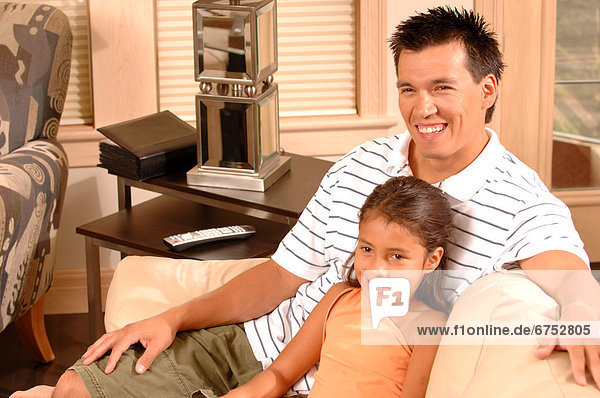 Father and Daughter on Couch
