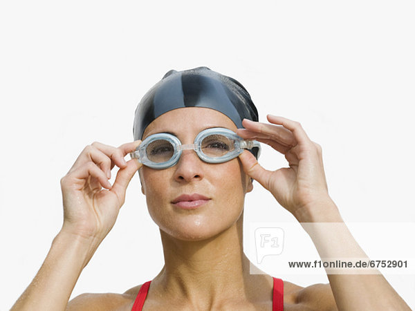 Woman wearing swimming goggles