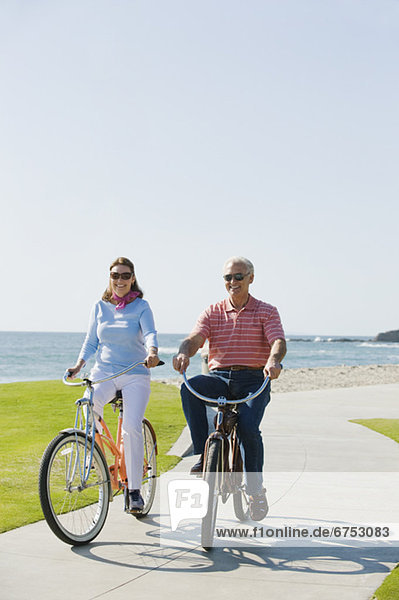 Couple riding bicycles