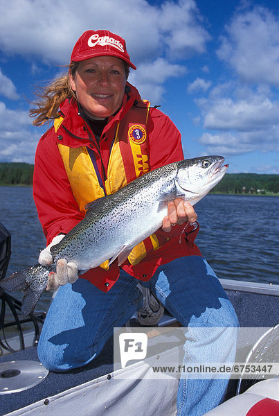 Woman with a Rainbow Trout  Northern Ontario