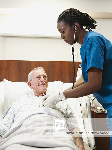 Senior patient and nurse