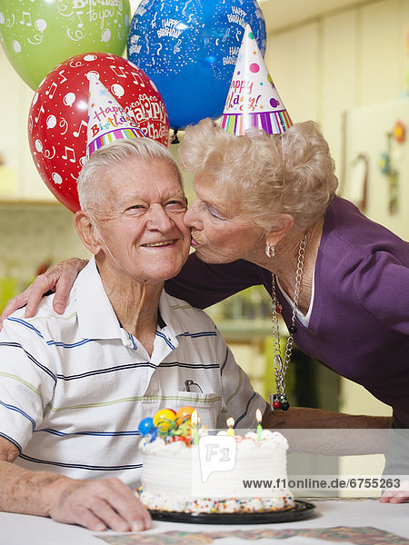 Senior couple celebrating birthday