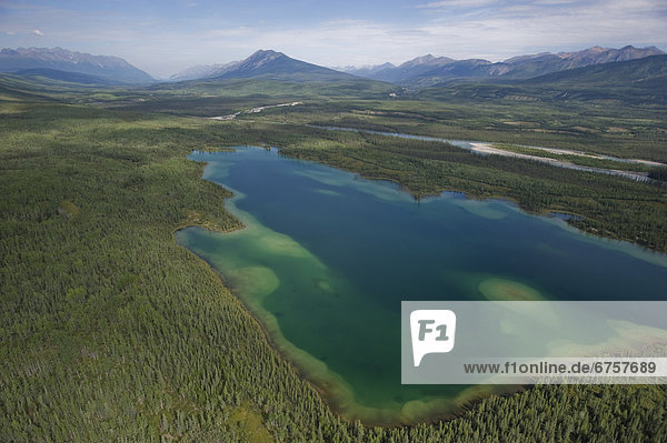 Aerial view of multi-colored Rabbitkettle Lake  Nahanni National Park  Northwest Territories