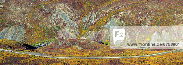 Panoramic of a stretch of the Dempster Highway in Autumn  Yukon