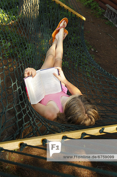 Young Girl Reading in a Hammock  Lac des Neiges  Quebec