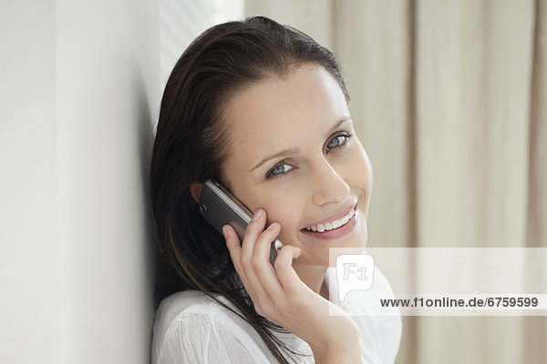 Pretty woman talking on cell phone