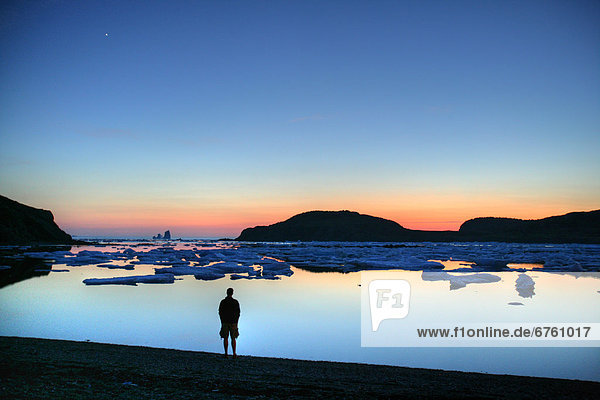 Silhouette of a person at Sunset  Twillingate  Newfoundland