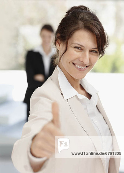 Businesswoman thumbs-up