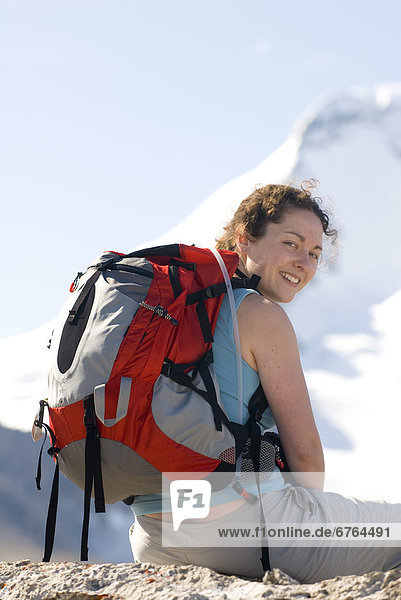 Woman Hiker Sitting with Backpack  Jasper National Park  Alberta