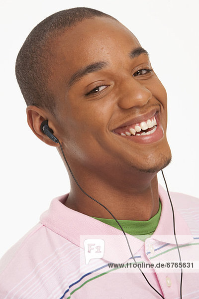 Smiling man wearing earphones