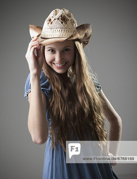 Schönheit  Hut  umkippen  lang  langes  langer  lange  Cowgirl