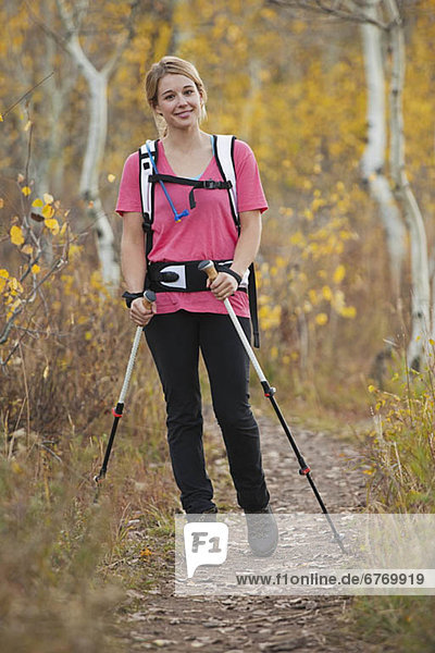 USA  Utah  young woman walking on trail