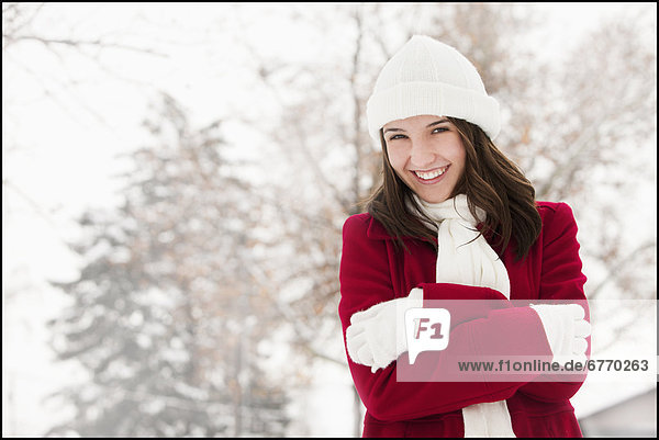 USA  Utah  Lehi  Portrait of young woman shivering in snow