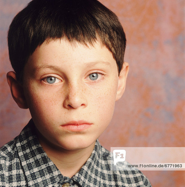 Portrait of a sad young boy