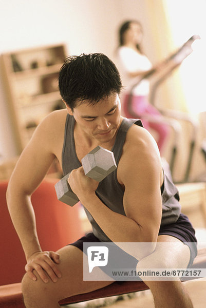 Man exercising with a dumbbell