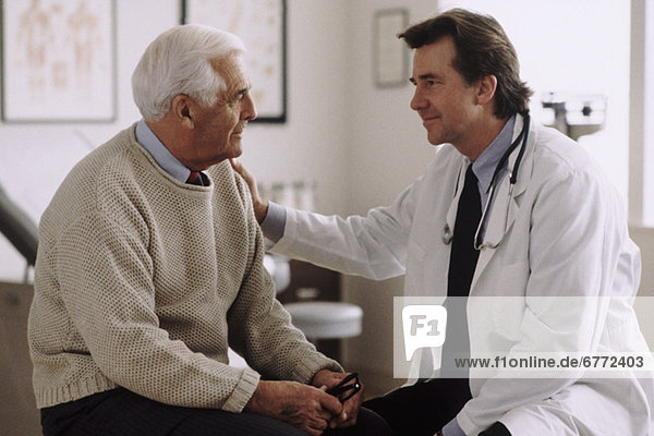 Doctor consulting with patient