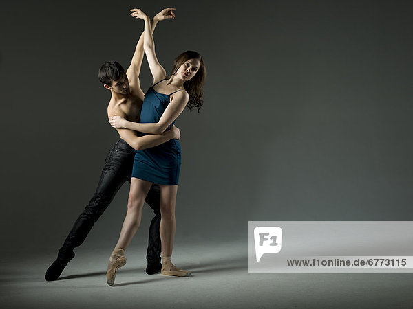 Two young ballet dancers  studio shot