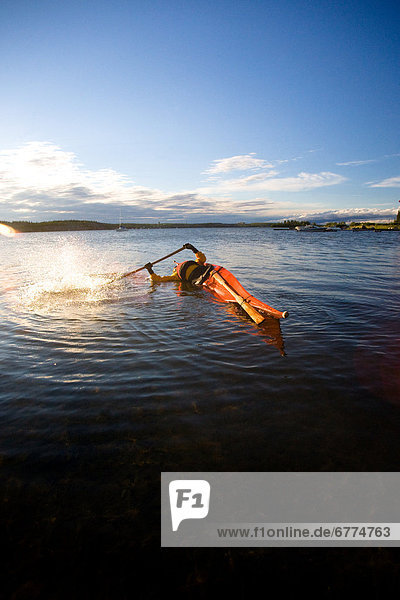 Kayaker flipping on the Back Bay portion of the Great Slave Lake in Yellowknife  Northwest Territories