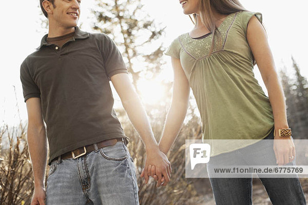 Couple walking hand in hand