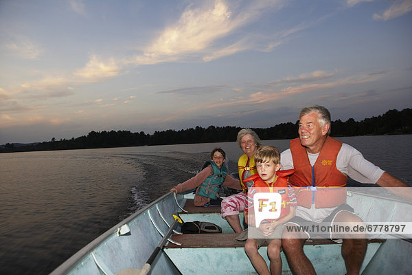 Grandparents and Grandchildren Boating at Sunset  Barry's Bay  Ontario
