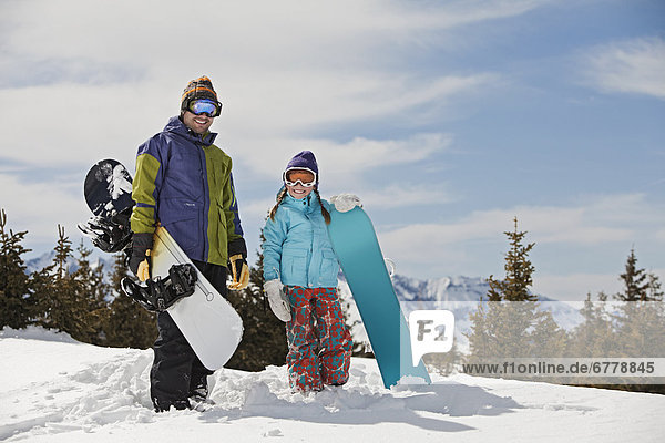 Vereinigte Staaten von Amerika  USA  Landschaftlich schön  landschaftlich reizvoll  Winter  Snowboard  Pose  Menschlicher Vater  Tochter  10-11 Jahre  10 bis 11 Jahre  Colorado  Telluride