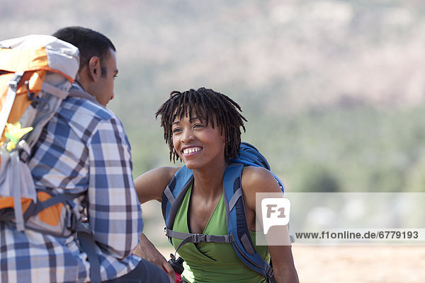 USA  Arizona  Sedona  Young couple hiking and enjoying desert scenery