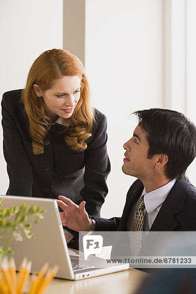 Business Man and Woman talking