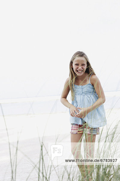 Girl smiling on beach
