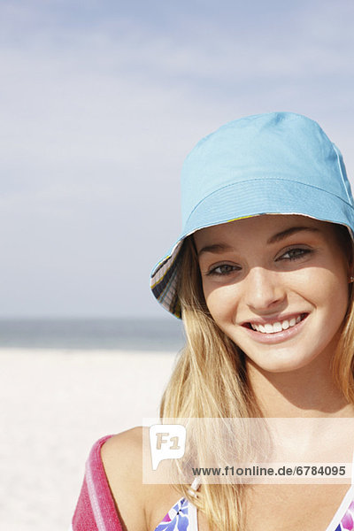 Portrait of teenage girl on beach
