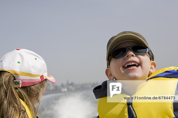 Little Boy and Girl on back of a Boat  Burrard Inlet  British Columbia