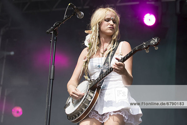 Solveig Heilo with a banjo from the Norwegian girl band Katzenjammer performing live at Heitere Open Air in Zofingen  Aargau  Switzerland  Europe