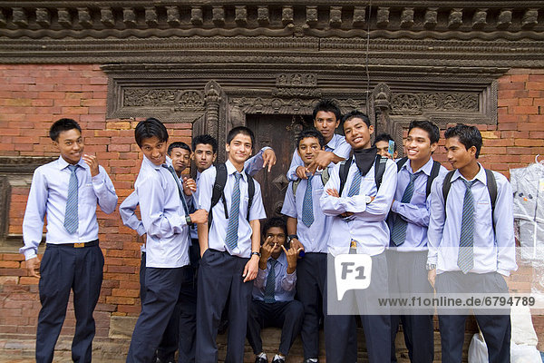 Nepal  Kathmandu  Bhaktapur  group of male high school students in uniform.