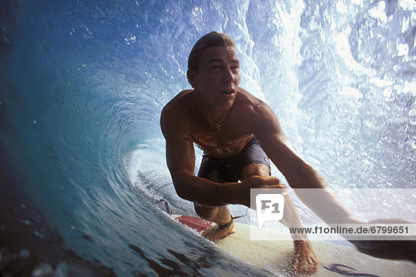 Hawaii  Oahu  North Shore  Pipeline  Pancho Sullivan surfs pipeline  in the tube  arms front