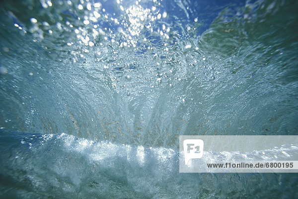 spiralförmig  spiralig  Spirale  Spiralen  spiralförmiges   Unterwasseraufnahme  Sonnenlicht  glitzern  Hawaii  Wasserwelle  Welle
