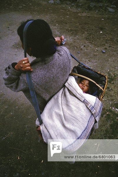 Mother Carrying Child  Lukla  Solo Khumbu Region  Nepal